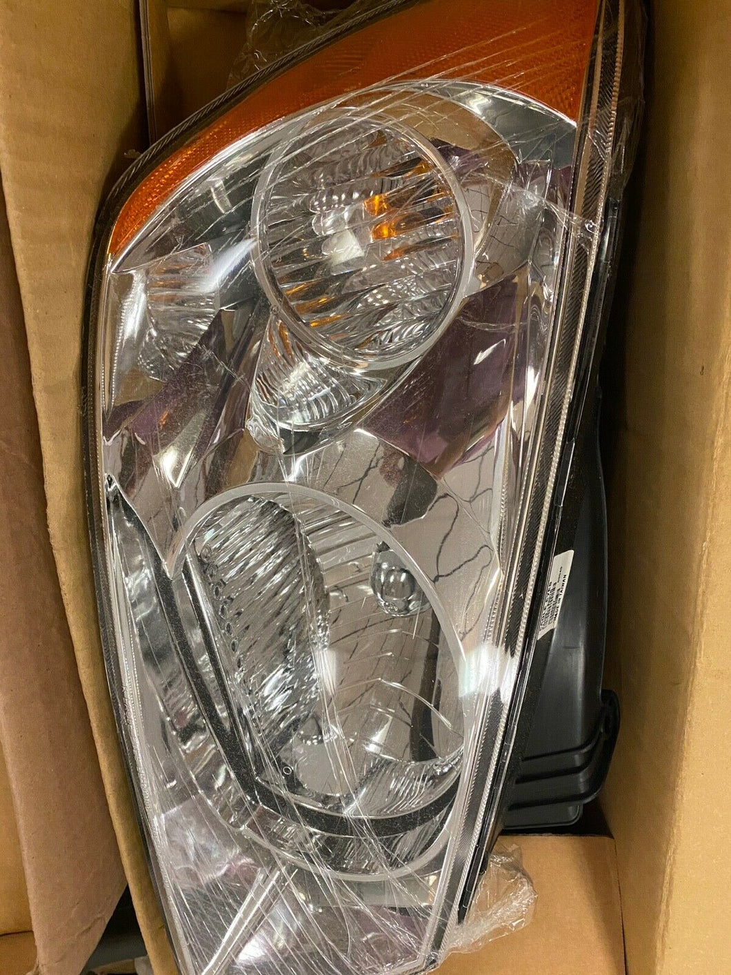 NIB Eagle Eyes, Driver Headlight for (04-05)  Spectra  KI2502116!